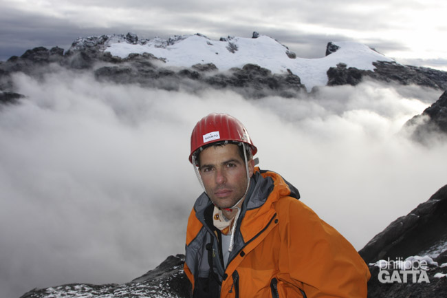 Philippe high up on Carstensz. Ngga Pulu behind (© P. Gatta)